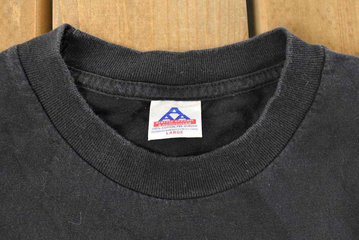 Vintage 1990s Meg Lee Chin Tour T-Shirt Men's Large from propervintagecanada