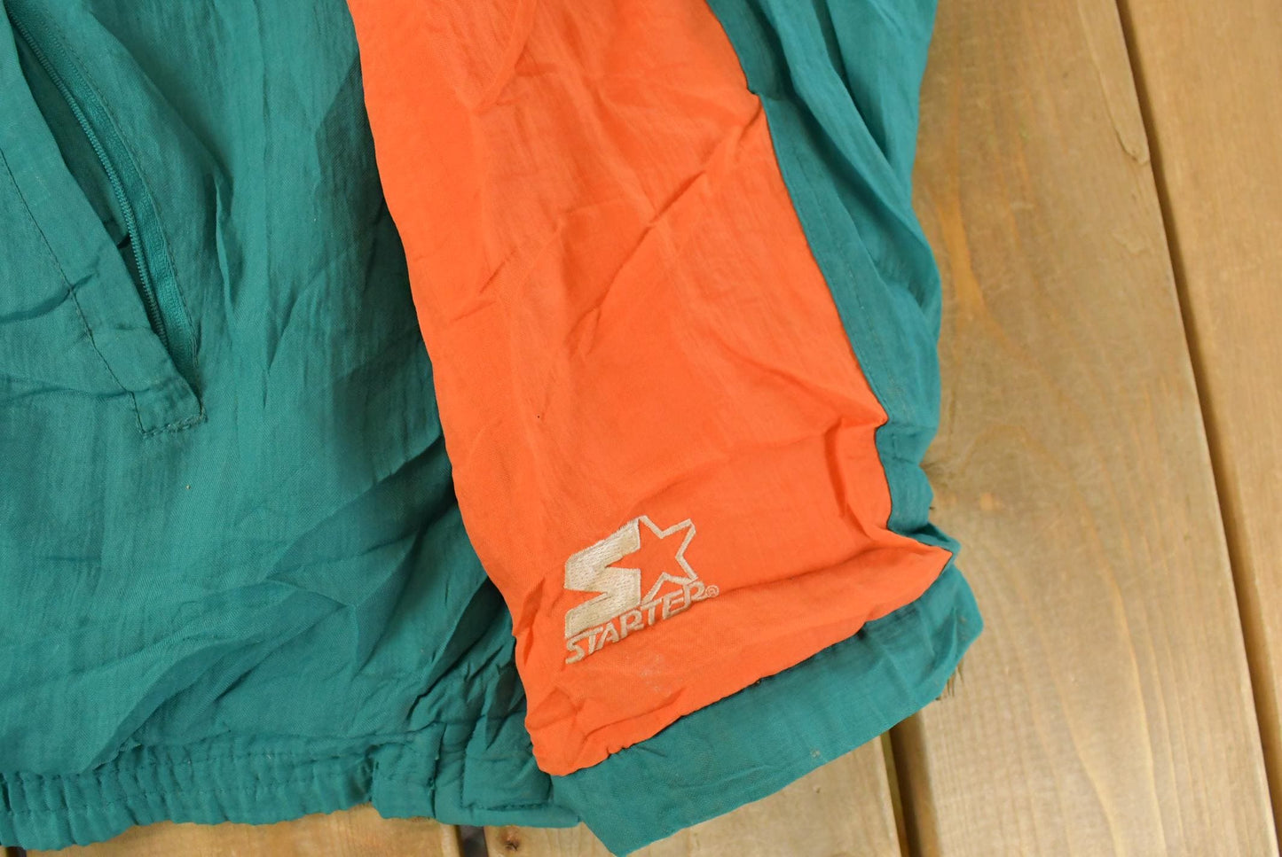 Vintage 1990s Miami Dolphins NFL Pro Line Starter Puffer Jacket Men's XL from propervintagecanada