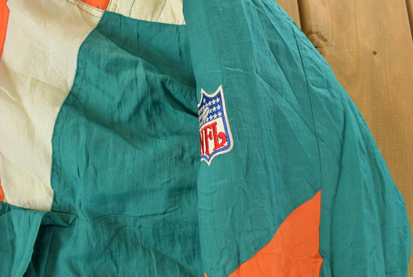 Vintage 1990s Miami Dolphins NFL Pro Line Starter Puffer Jacket Men's XL from propervintagecanada