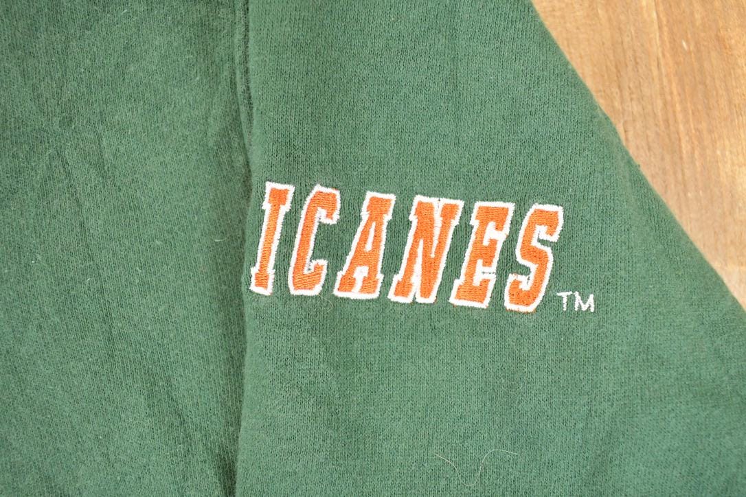 Vintage 1990s Miami Hurricanes Embroidered University Hoodie Sweater Mens L from propervintagecanada