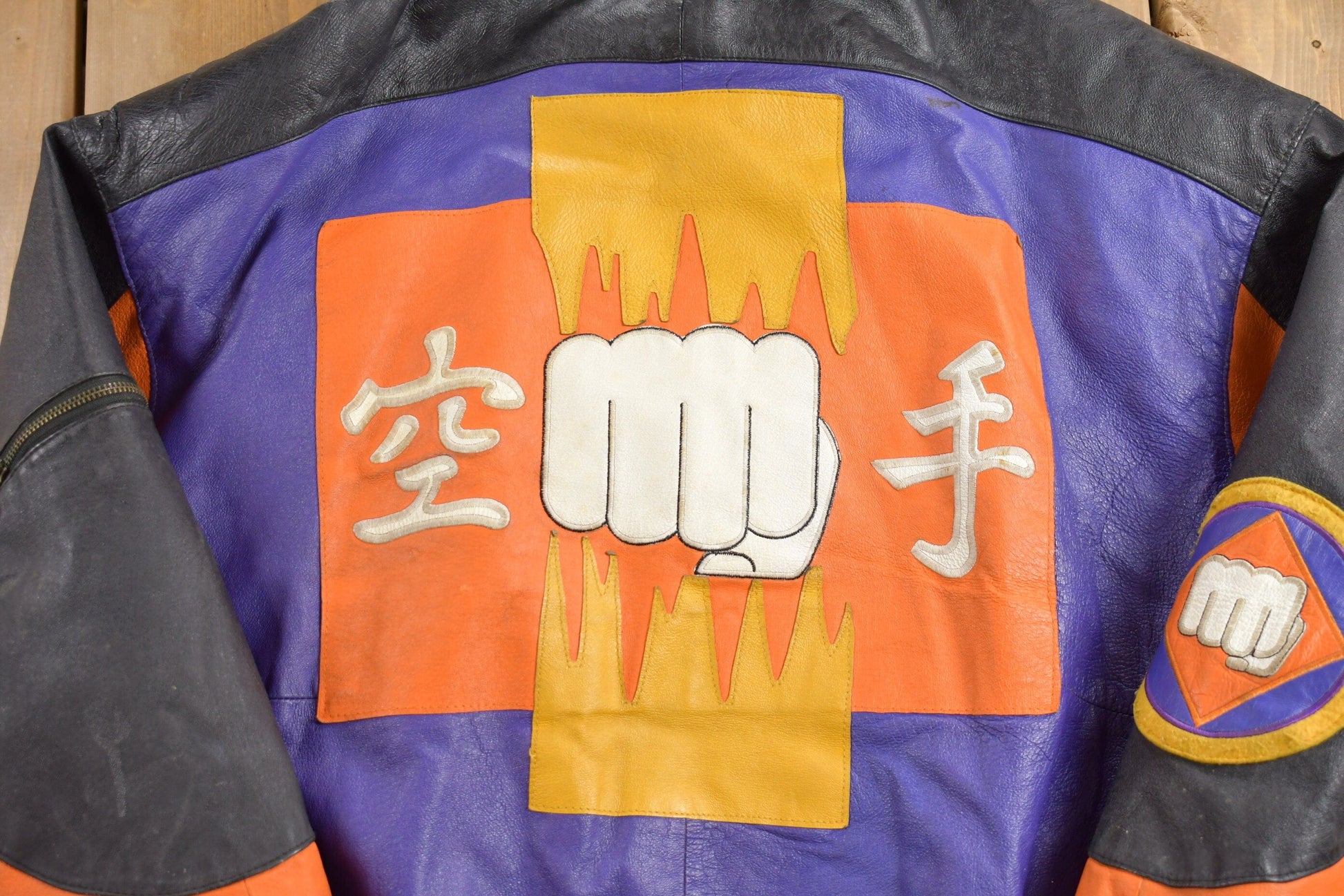 Vintage 1990s Micheal Hoban Martial Arts Patchwork Leather Jacket Men's XL from propervintagecanada