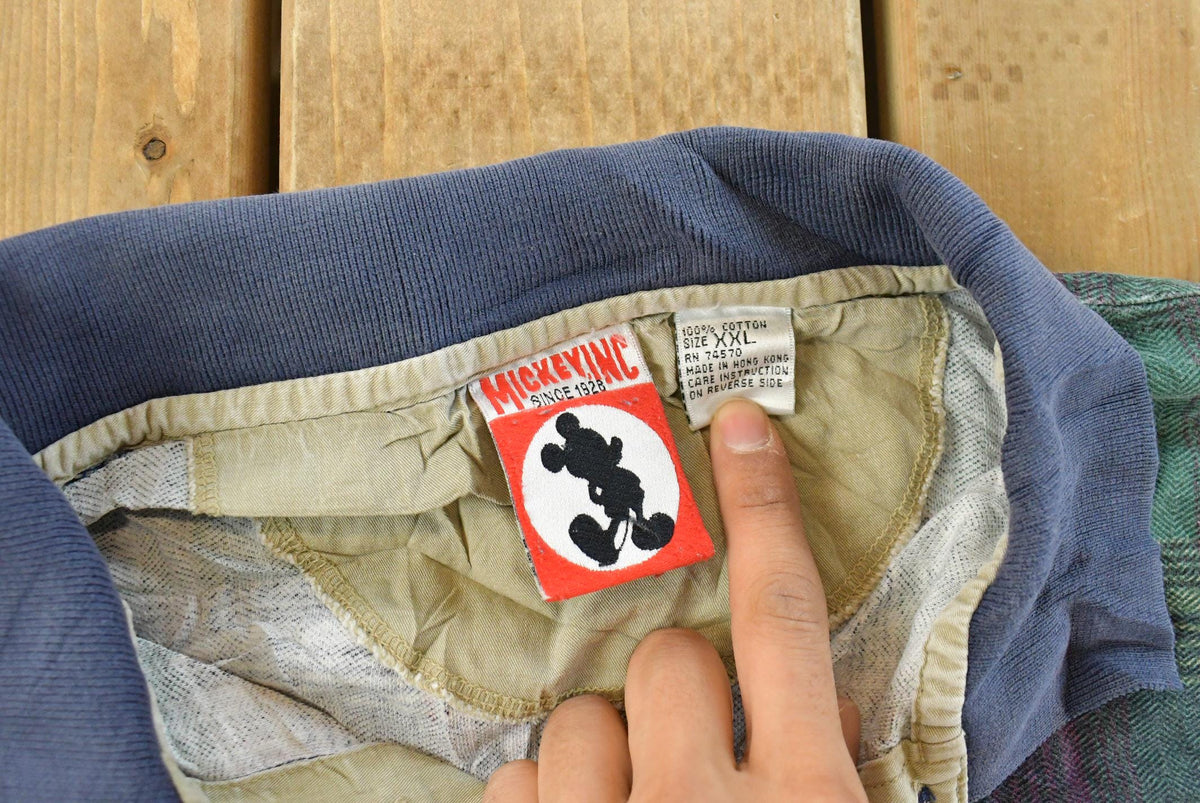 Vintage 1990s Mickey Inc Mickey Mouse Plaid Polo Shirt Men's 2XL from propervintagecanada