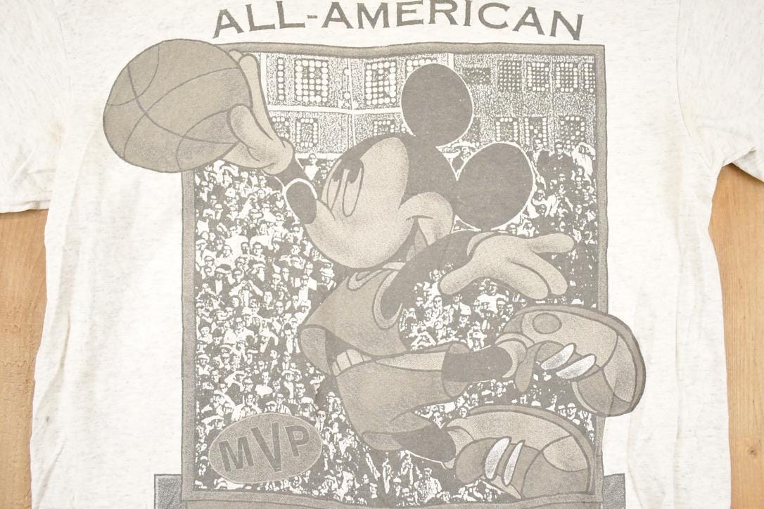 Vintage 1990s Mickey Mouse Basketball Disney T-Shirt Men's M from propervintagecanada