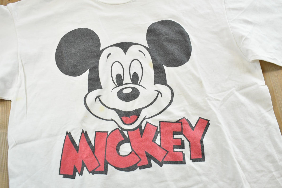 Vintage 1990s Mickey Mouse Disney Character Fashions T-Shirt Men's Large from propervintagecanada