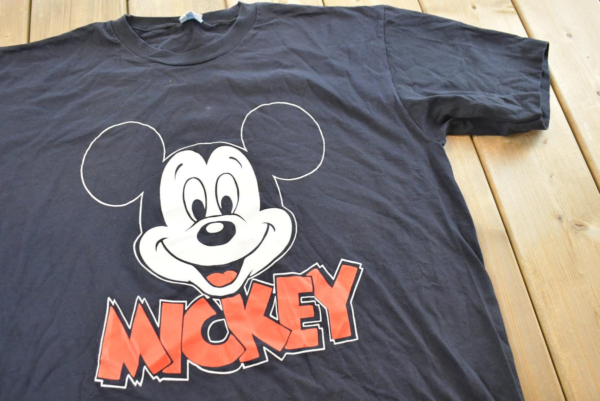 Vintage 1990s Mickey Mouse Disney Character Fashions T-Shirt Men's XL from propervintagecanada