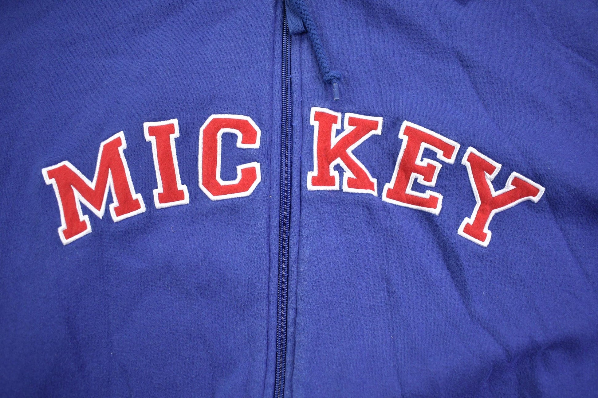 Vintage 1990s Mickey Mouse "Mickey" Spell-out Disney Hoodie Men's Large from propervintagecanada