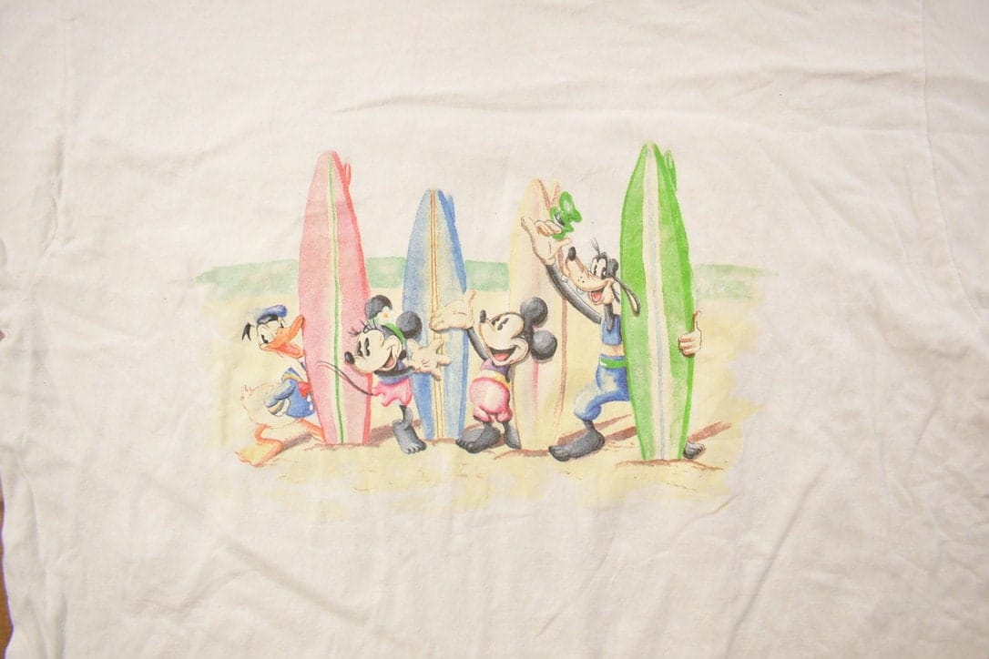 Vintage 1990s Mickey Mouse Surfer Graphic T Shirt Men's Large from propervintagecanada