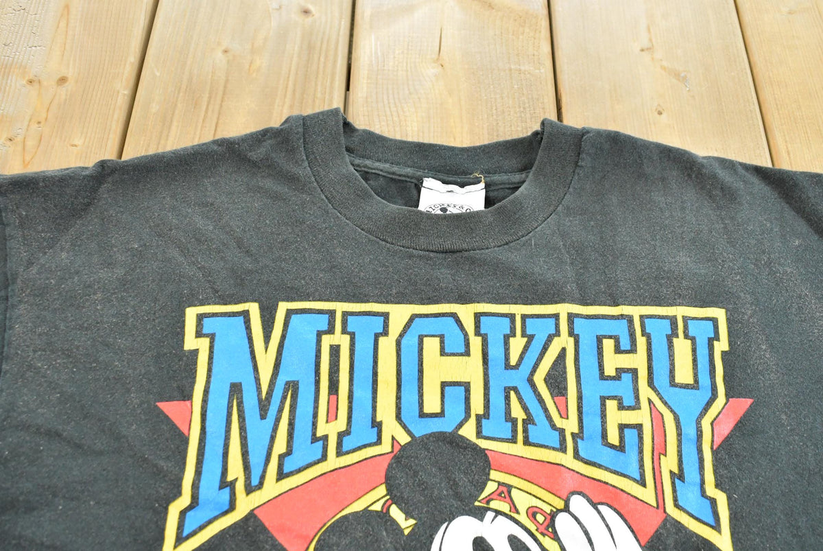Vintage 1990s Mickey University Disney T-Shirt Men's XL from propervintagecanada
