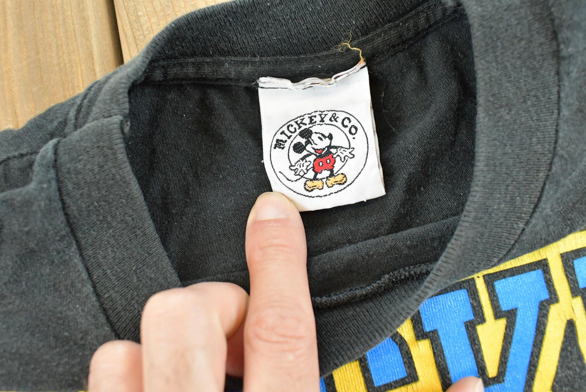 Vintage 1990s Mickey University Disney T-Shirt Men's XL from propervintagecanada