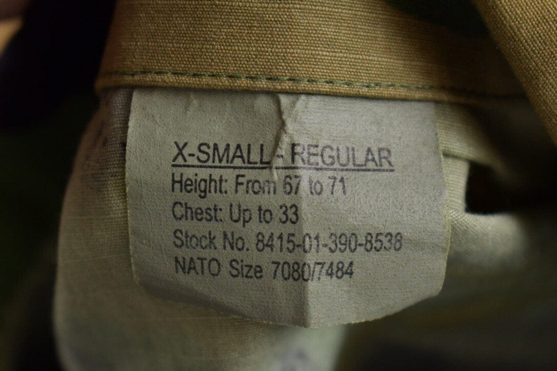 Vintage 1990s Military Camo Button Up Jacket Men's XS from propervintagecanada