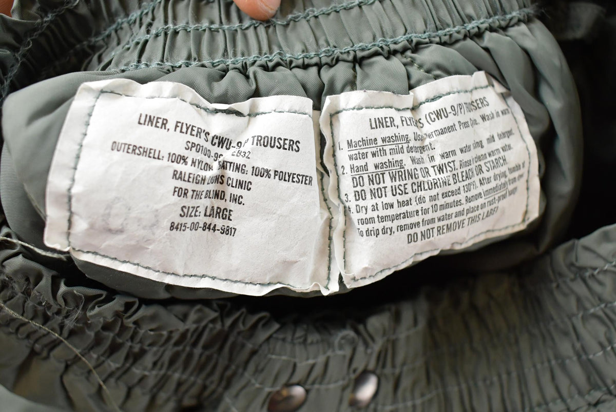 Vintage 1990s Military Quilted Green Liner Flyers Pants Men's 22 x 27.5 from propervintagecanada