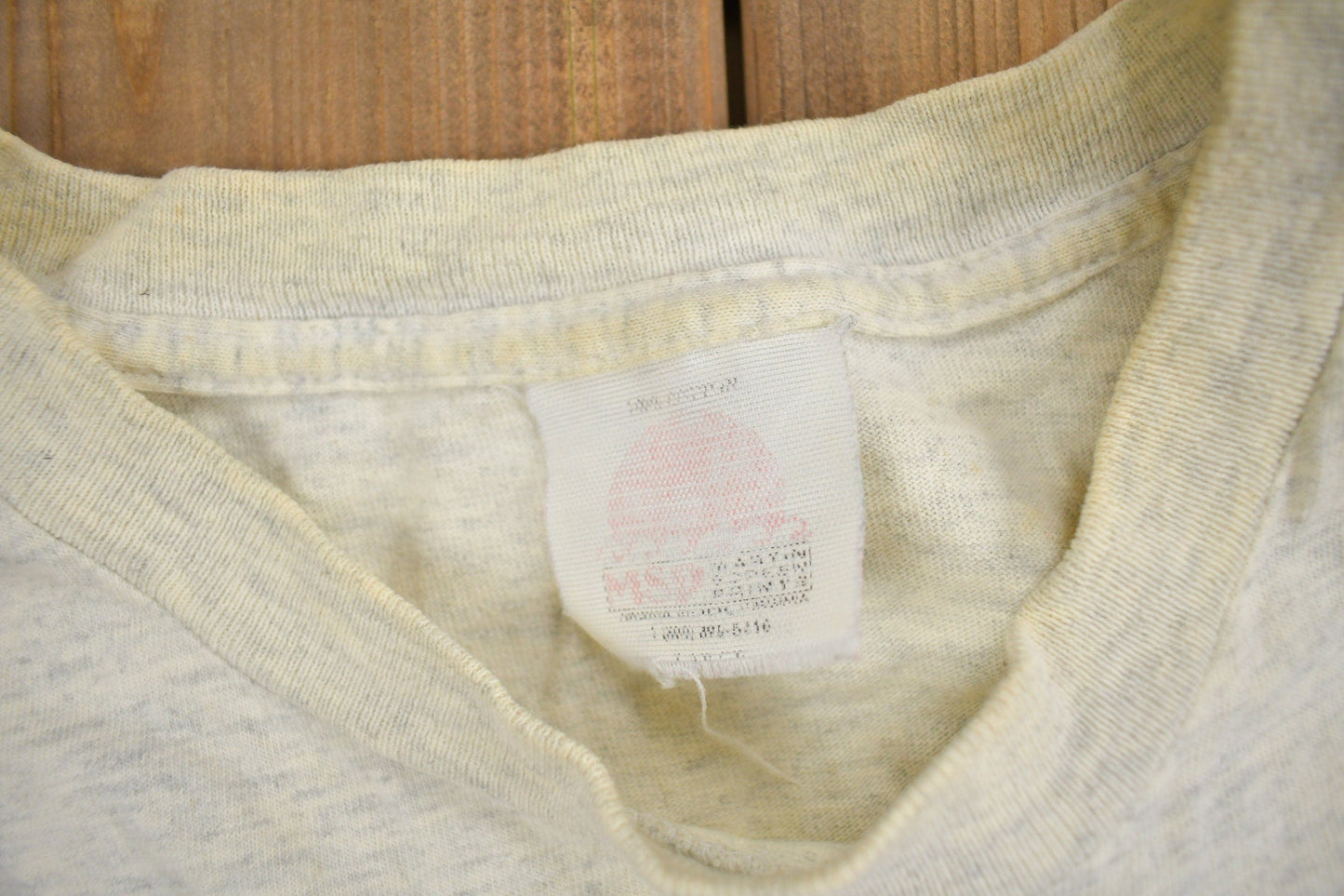 Vintage 1990s Milkovich Wrestling Conference Champions Graphic T Shirt Men's XL from propervintagecanada