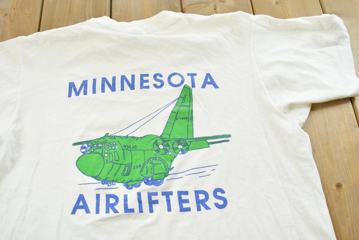 Vintage 1990s Minnesota Air Lifters National Guard Single Stitch T-Shirt Mens L from propervintagecanada
