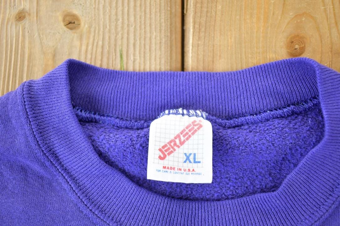 Vintage 1990s Minnesota Big Plaid M Souvenir Crewneck Sweatshirt Made In USA Men's XL from propervintagecanada