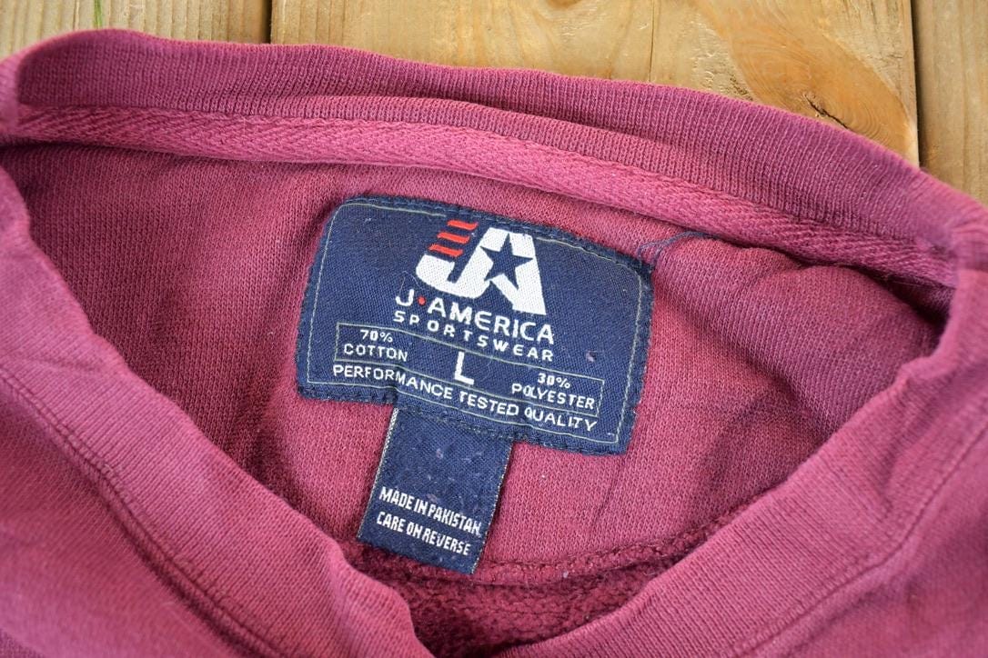 Vintage 1990s Minnesota Embroidered Souvenir Crewneck Sweatshirt Made In USA Men's Large from propervintagecanada