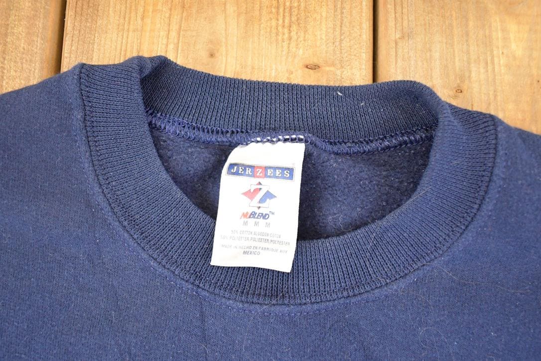 Vintage 1990s Minnesota Pines Embroidered Souvenir Crewneck Sweatshirt Men's M from propervintagecanada