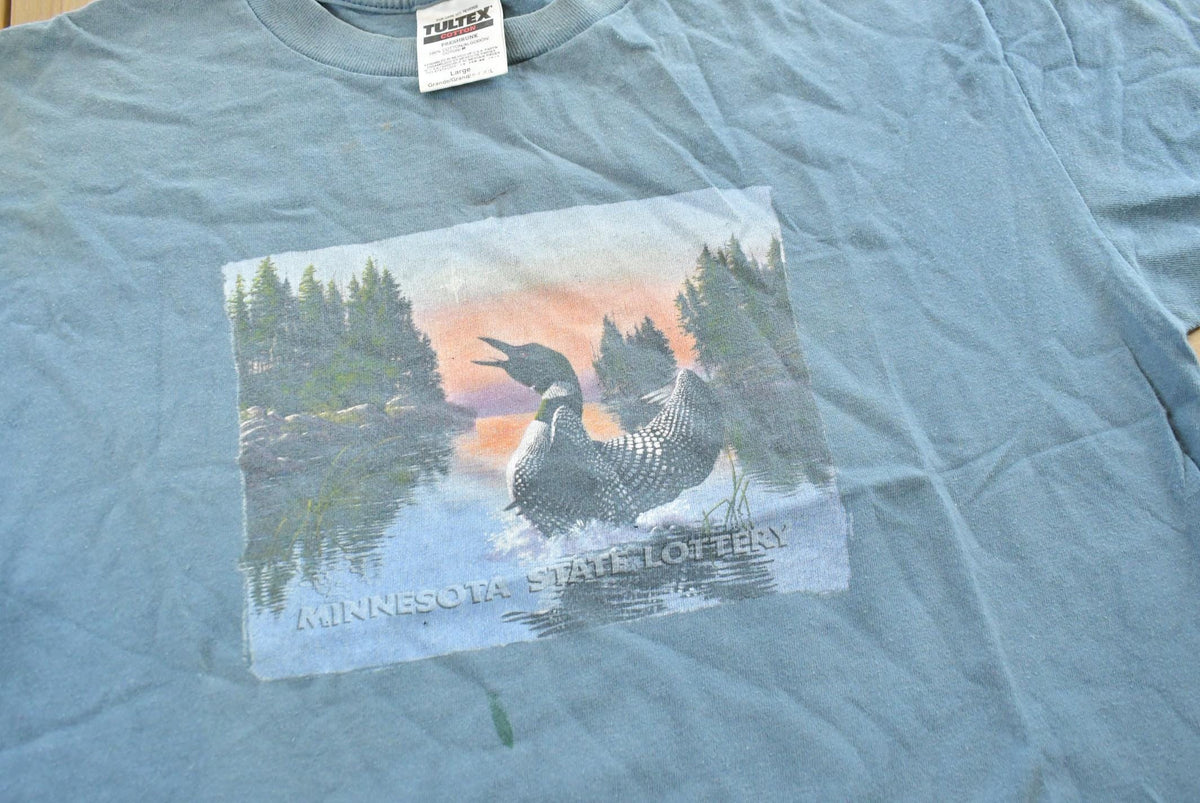 Vintage 1990s Minnesota State Lottery Loon T-Shirt Men's Large from propervintagecanada