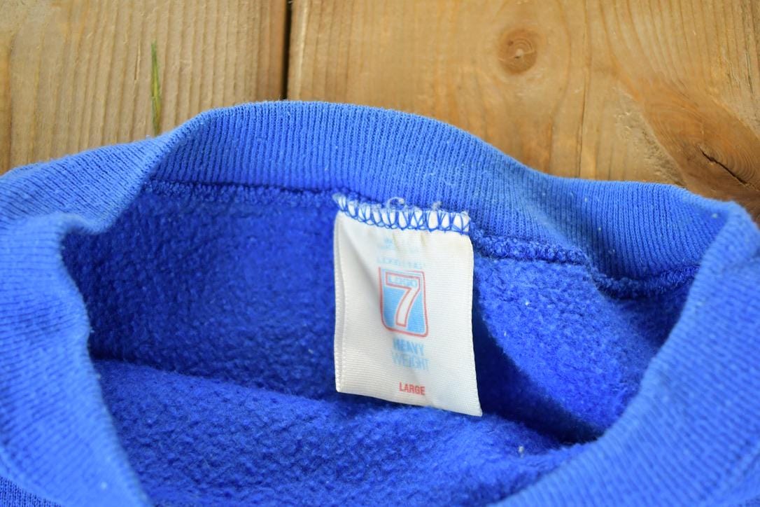 Vintage 1990s Minnesota Timberwolves Logo 7 NBA Crewneck Sweatshirt Men's XL from propervintagecanada