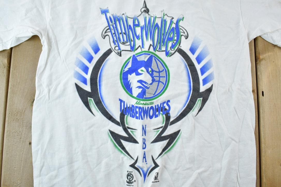 Vintage 1990s Minnesota Timberwolves Nba Basketball Souvenir Single Stitch Graphic Print T-Shirt Men's Medium from propervintagecanada