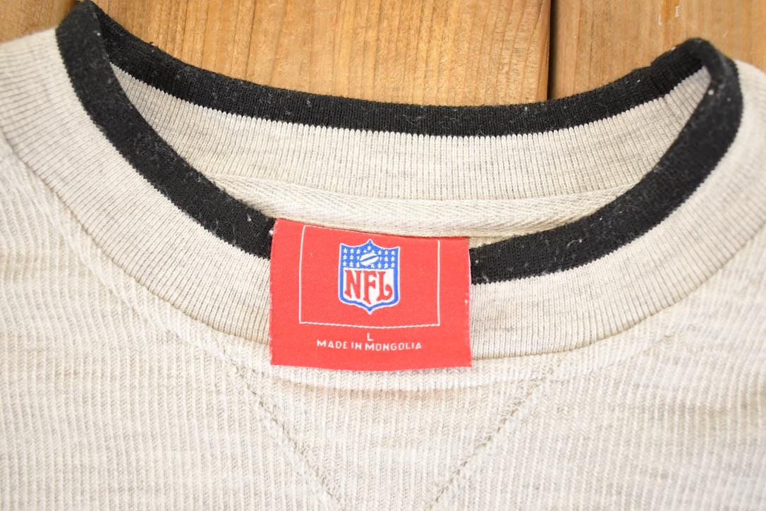 Vintage 1990s Minnesota Vikings Crew Neck Sweatshirt Men's XL from propervintagecanada