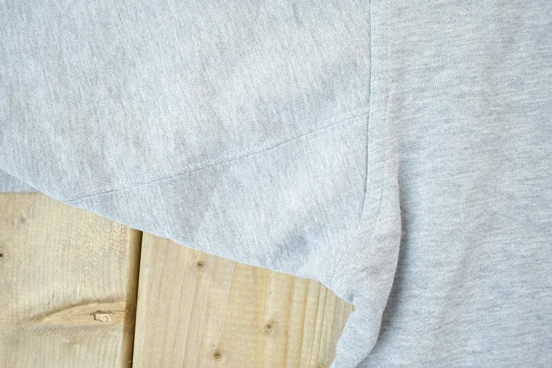 Vintage 1990s Minnesota Vikings Embroidered NFL Crewneck PUMA Sweatshirt Men's 2XL from propervintagecanada