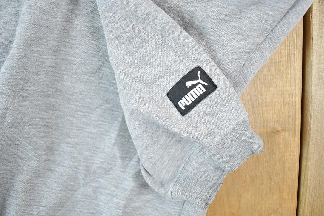 Vintage 1990s Minnesota Vikings Embroidered NFL Crewneck PUMA Sweatshirt Men's 2XL from propervintagecanada