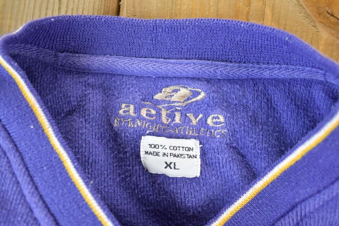 Vintage 1990s Minnesota Vikings NFL Embroidered V Neck Sweatshirt Men's XL from propervintagecanada