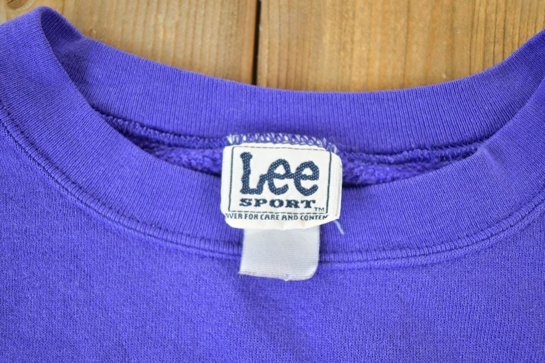 Vintage 1990s Minnesota Vikings NFL Lee Sport Crewneck Sweatshirt from propervintagecanada
