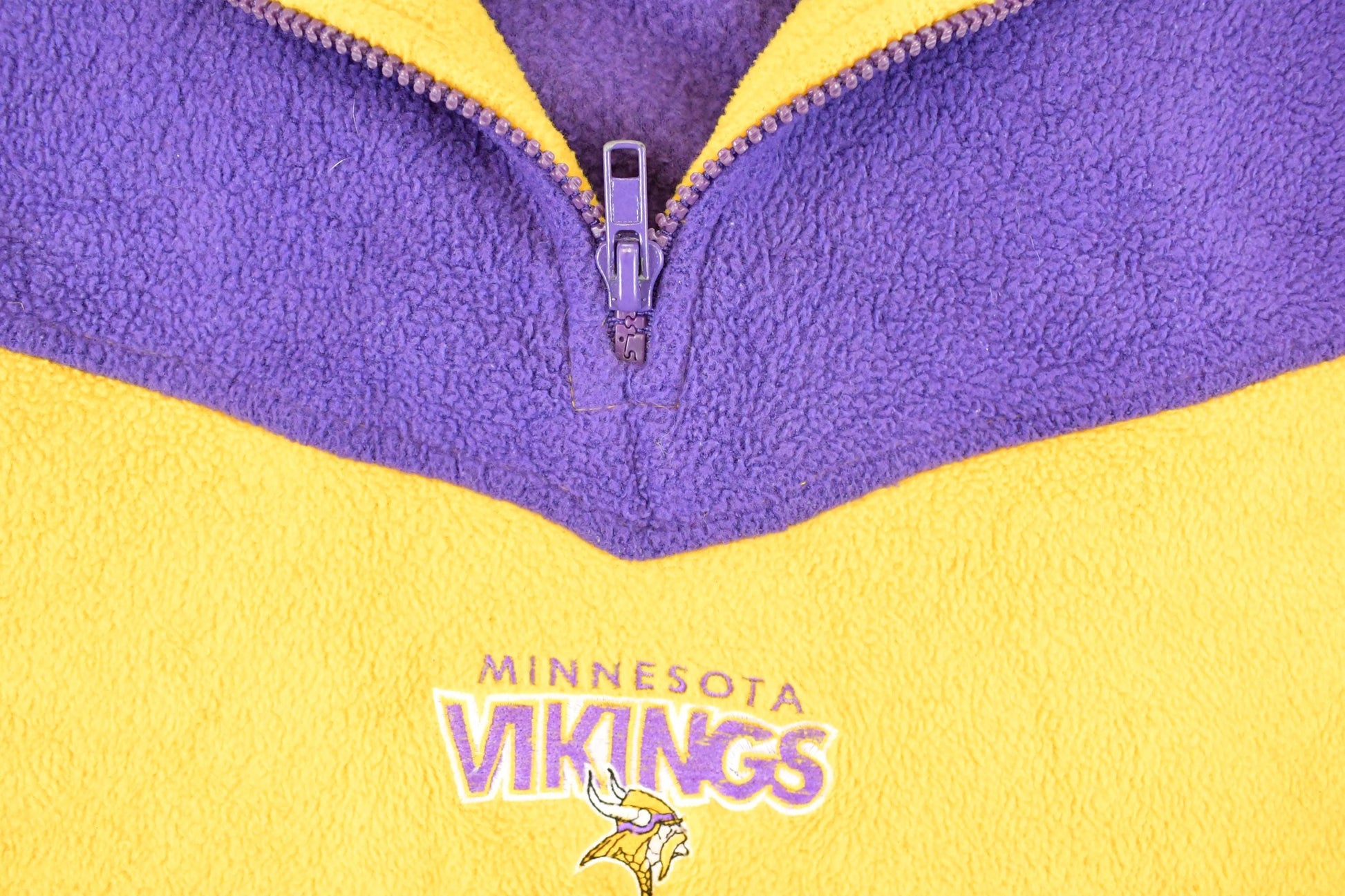 Vintage 1990s Minnesota Vikings NFL Quarter Zip Fleece Sweater Men's XL from propervintagecanada