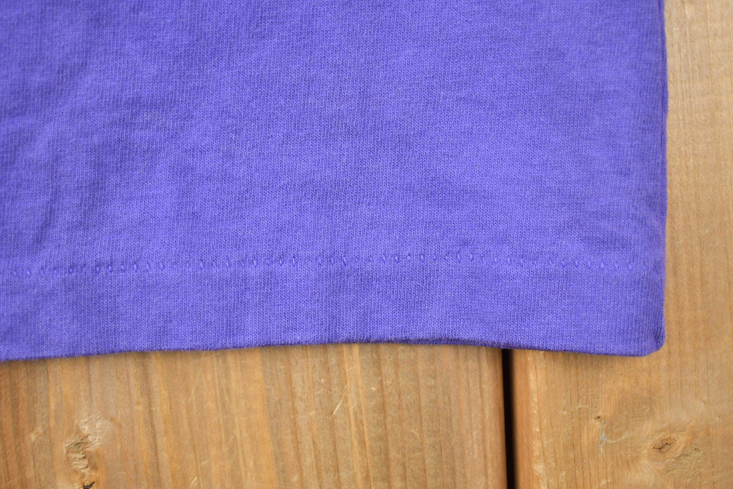 Vintage 1990s Minnesota Vikings V Neck Ringer NFL Graphic T-Shirt / NFL / 90s Streetwear / Sportswear / Single Stitch / Made in USA from propervintagecanada