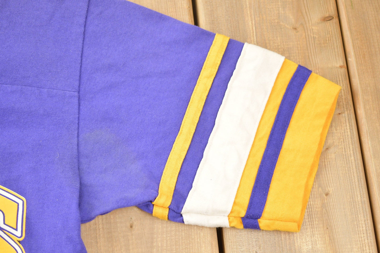 Vintage 1990s Minnesota Vikings V Neck Ringer NFL Graphic T-Shirt / NFL / 90s Streetwear / Sportswear / Single Stitch / Made in USA from propervintagecanada