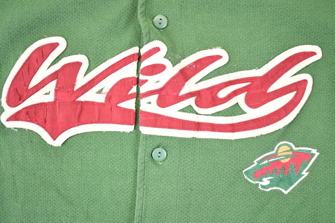Vintage 1990s Minnesota Wild MLB Button Up Jersey Men's M from propervintagecanada