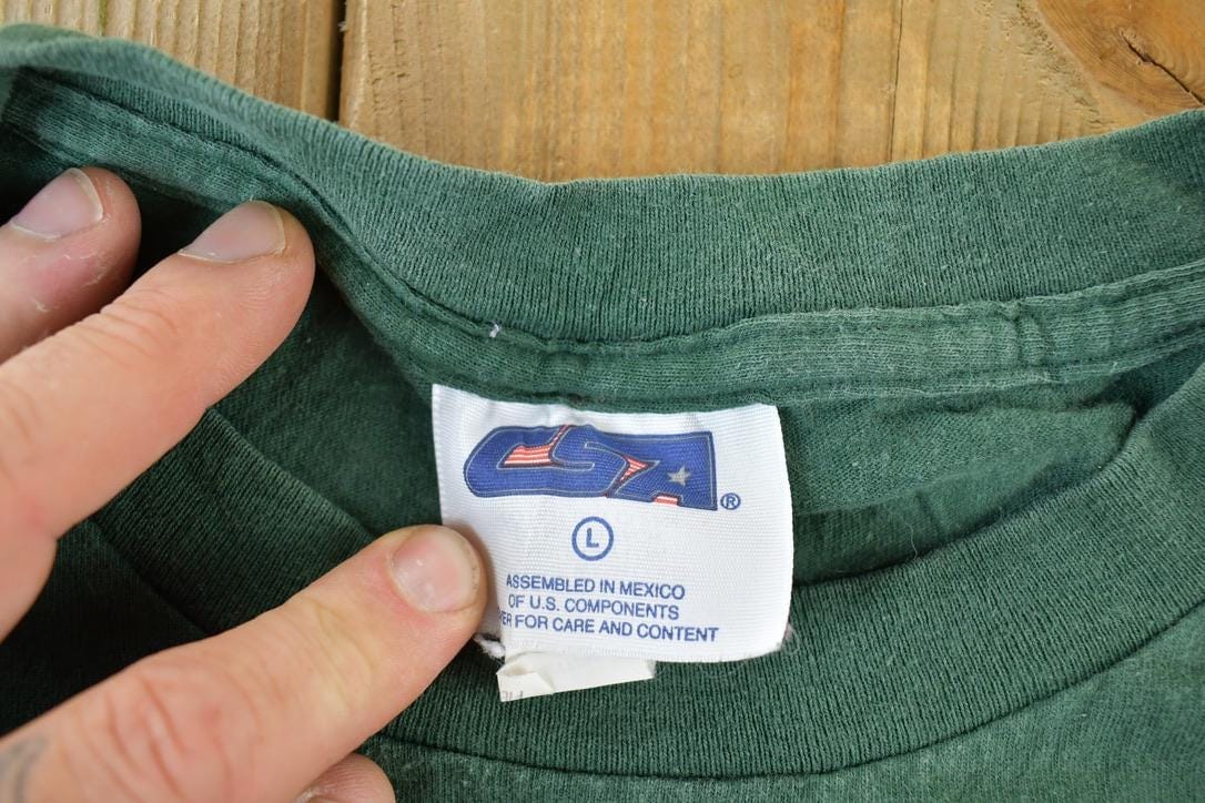 Vintage 1990s Minnesota Wild NHL Graphic T-Shirt Men's Large from propervintagecanada