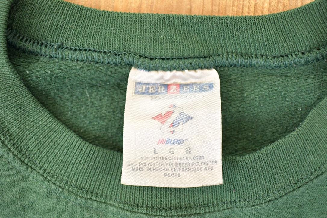 Vintage 1990s Minnesota Wild Winery Graphic Print Crewneck Sweatshirt Men's L from propervintagecanada