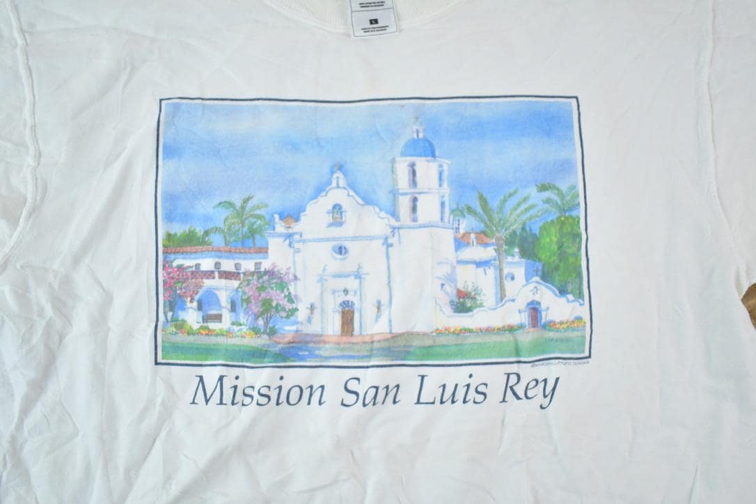 Vintage 1990s Mission San Luis Rey Souvenir Single Stitch Graphic Print T-Shirt Men's Large from propervintagecanada