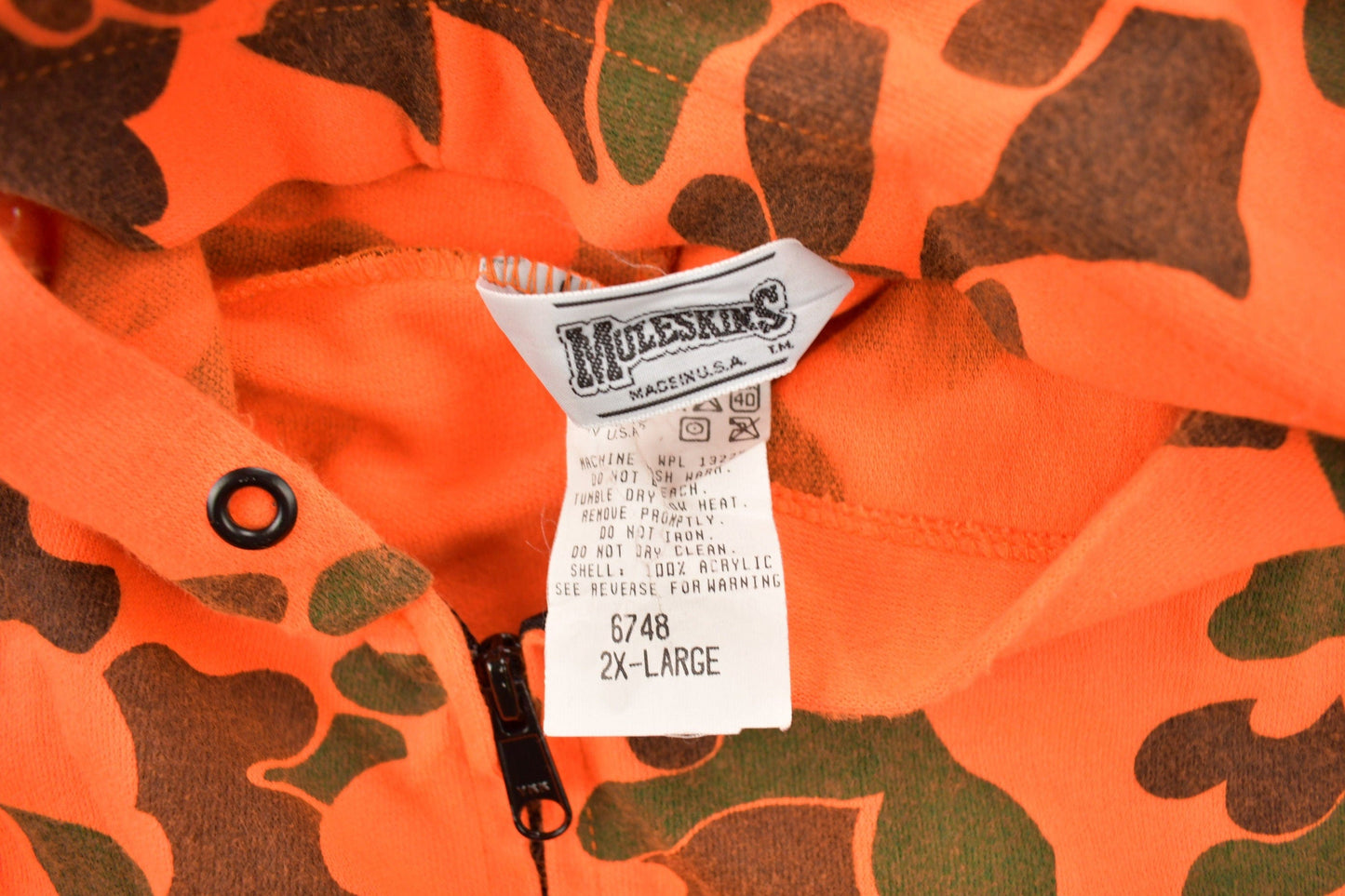 Vintage 1990s Moleskins Orange Camo Graphic Hoodie Men's 2XL from propervintagecanada