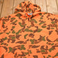 Vintage 1990s Moleskins Orange Camo Graphic Hoodie Men's 2XL from propervintagecanada