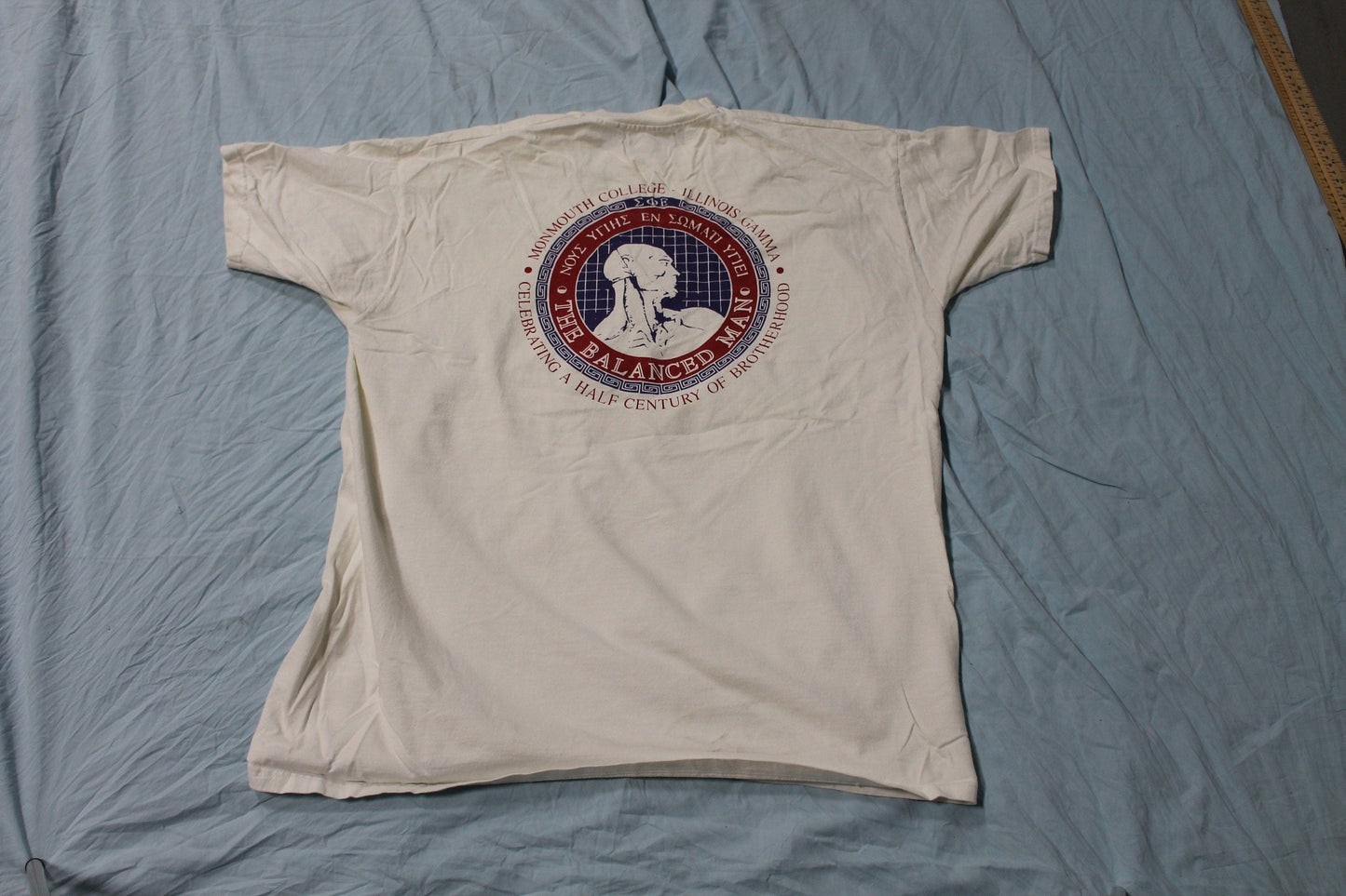 Vintage 1990s Monmouth College Illinois Gamma Graphic T-Shirt Men's 2XL from propervintagecanada