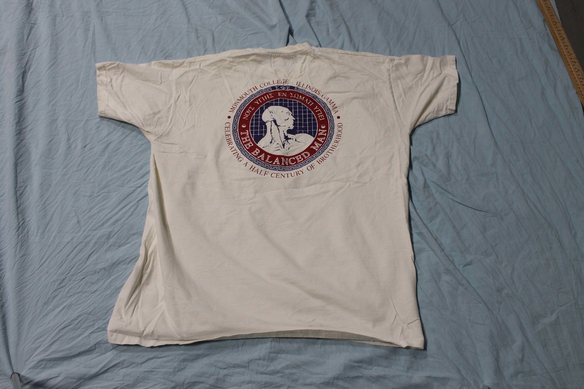 Vintage 1990s Monmouth College Illinois Gamma Graphic T-Shirt Men's 2XL from propervintagecanada