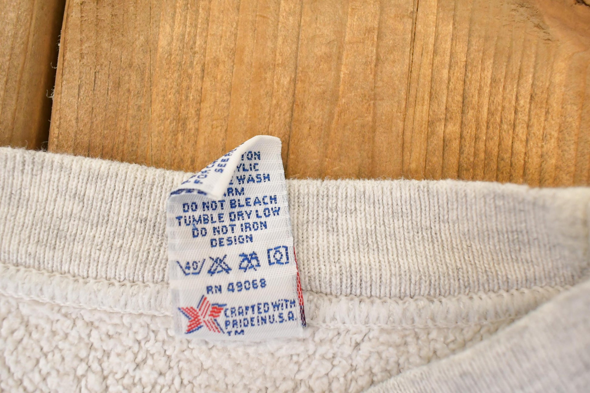 Vintage 1990s Monticello Tennis Graphic Print University Crewneck Sweater Men's L from propervintagecanada