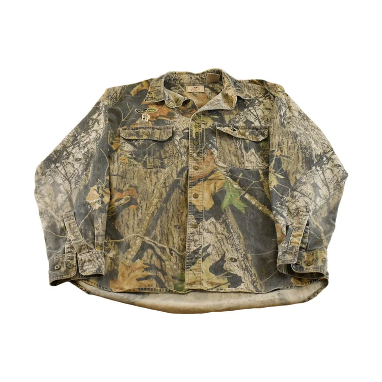 Vintage 1990s Mossy Oak Apparel Tree Camo Cloth Button Up Shirt Men's L from propervintagecanada