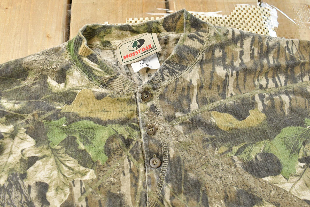 Vintage 1990s Mossy Oak Breakup Camo Collared Long Sleeve T-Shirt Men's L from propervintagecanada
