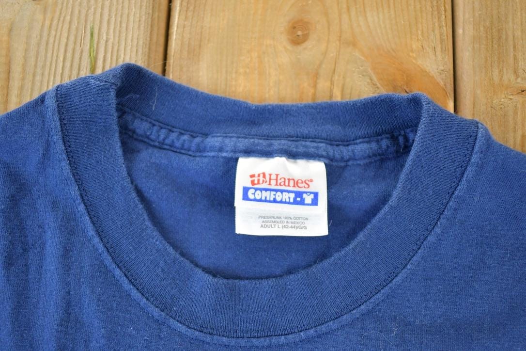 Vintage 1990s Mote Marine Lab Manatee Graphic T-Shirt Men's Large from propervintagecanada