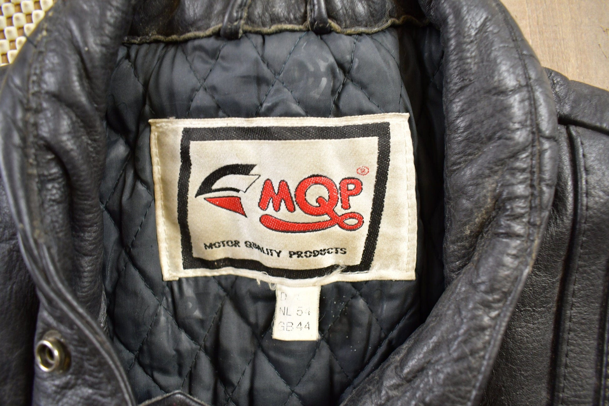 Vintage 1990s MQP Cafe Racer Leather Biker Jacket Men's Large from propervintagecanada