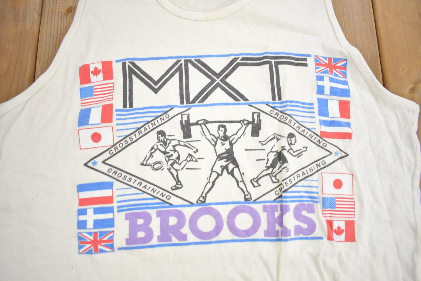 Vintage 1990s MXT Brooks Cross Training Graphic Tank Top Shirt Men's Medium from propervintagecanada