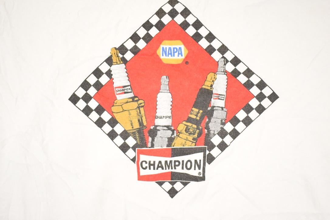 Vintage 1990s Napa Delta Champion Spark Plugs Souvenir Automotive T-Shirt Men's L from propervintagecanada