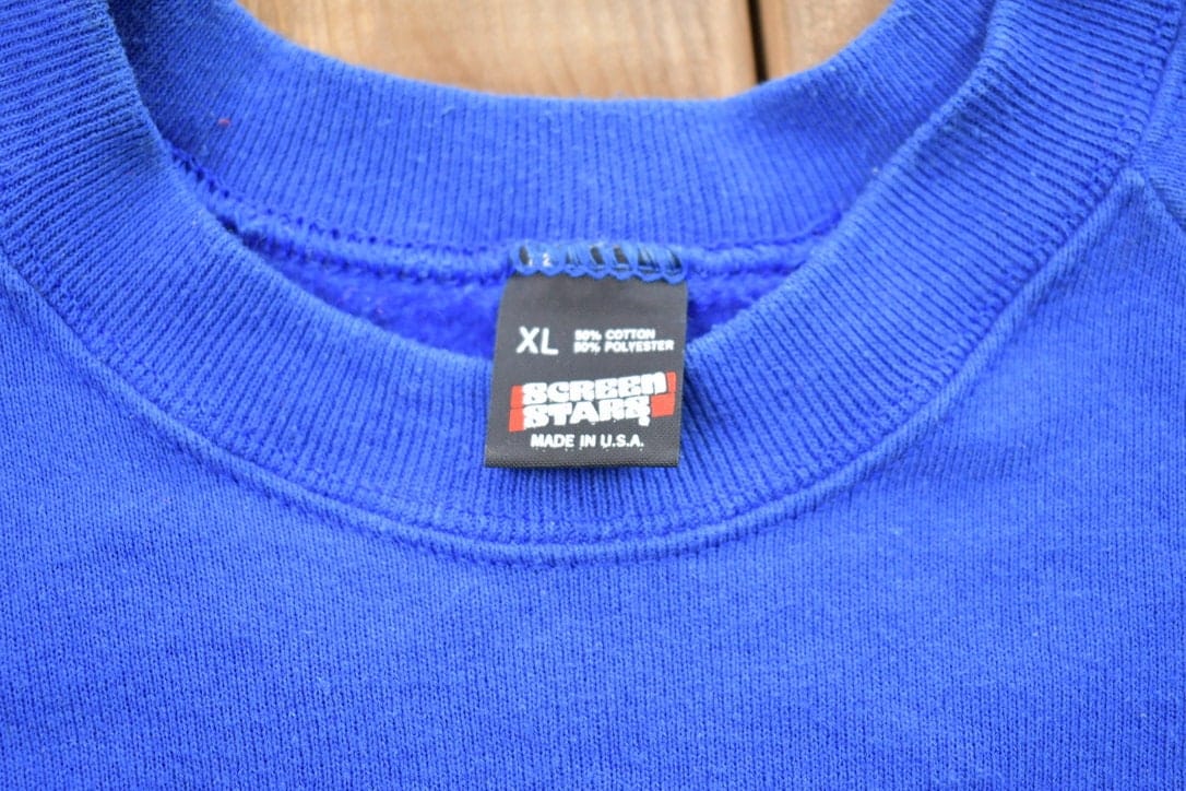 Vintage 1990s National Council of Teachers Of English Crewneck Sweatshirt from propervintagecanada