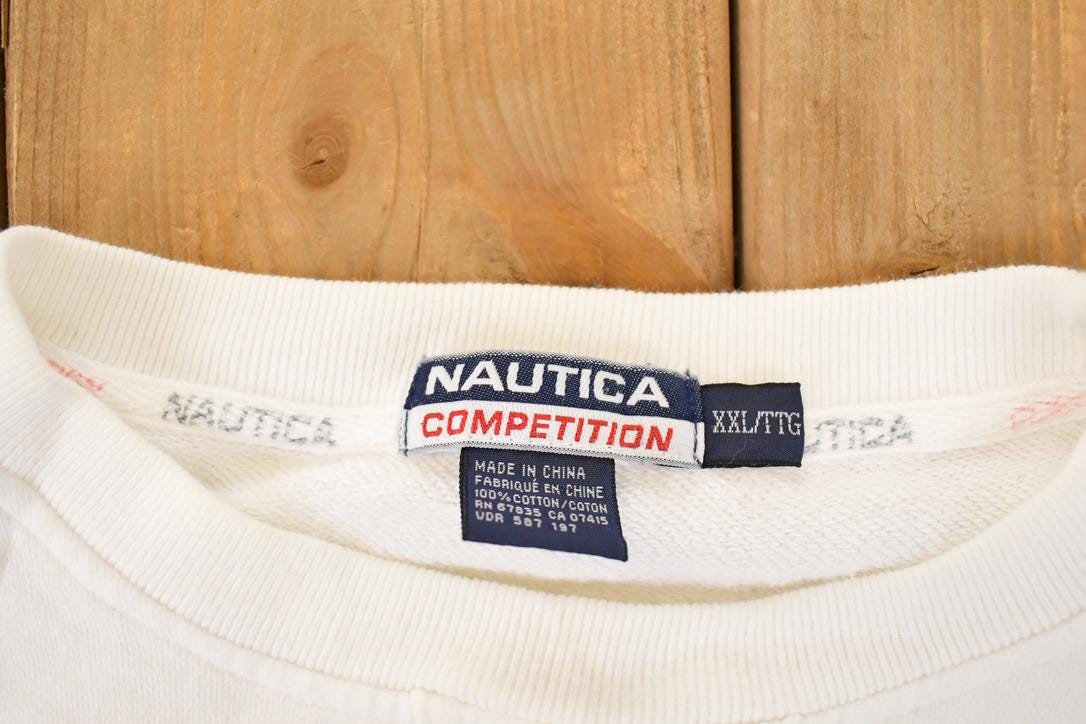 Vintage 1990s Nautica Competition Embroidered Crewneck Sweatshirt Mens XL from propervintagecanada