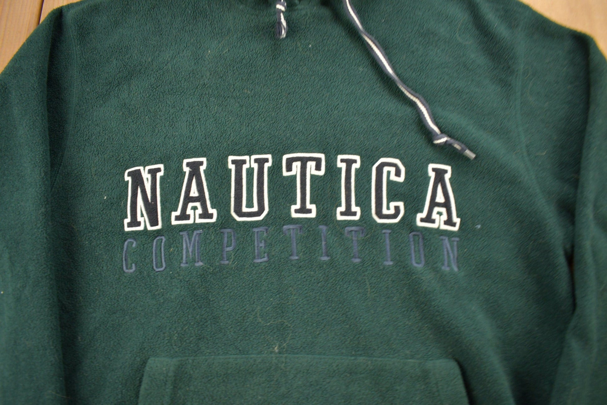 Vintage 1990s Nautica Competition Embroidered Fleece Hoodie Men's Large from propervintagecanada