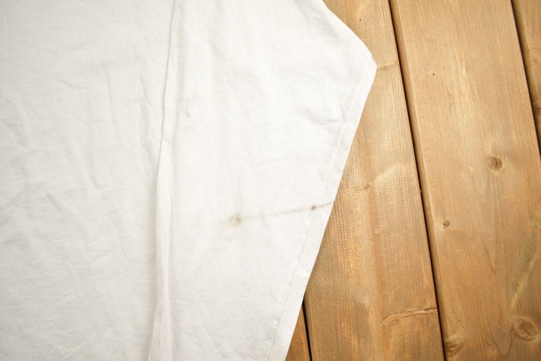 Vintage 1990s Nautica Jean Company Graphic T-Shirt Men's 2XL from propervintagecanada